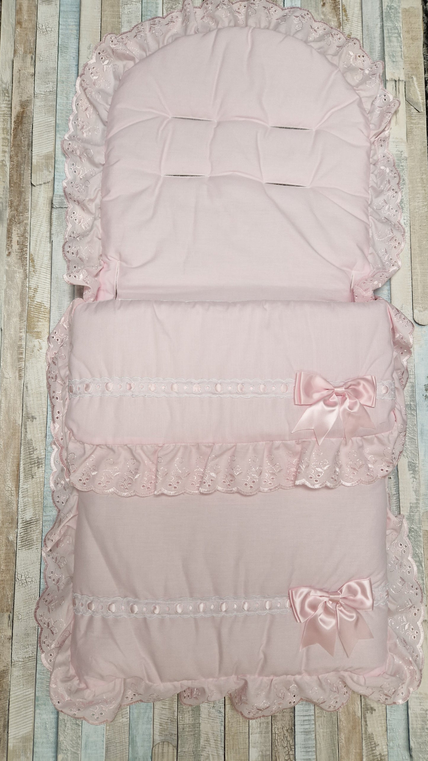 Baby Girls Pink Footmuff With Broderie Anglaise Lace Pink Satin Bow To Side
