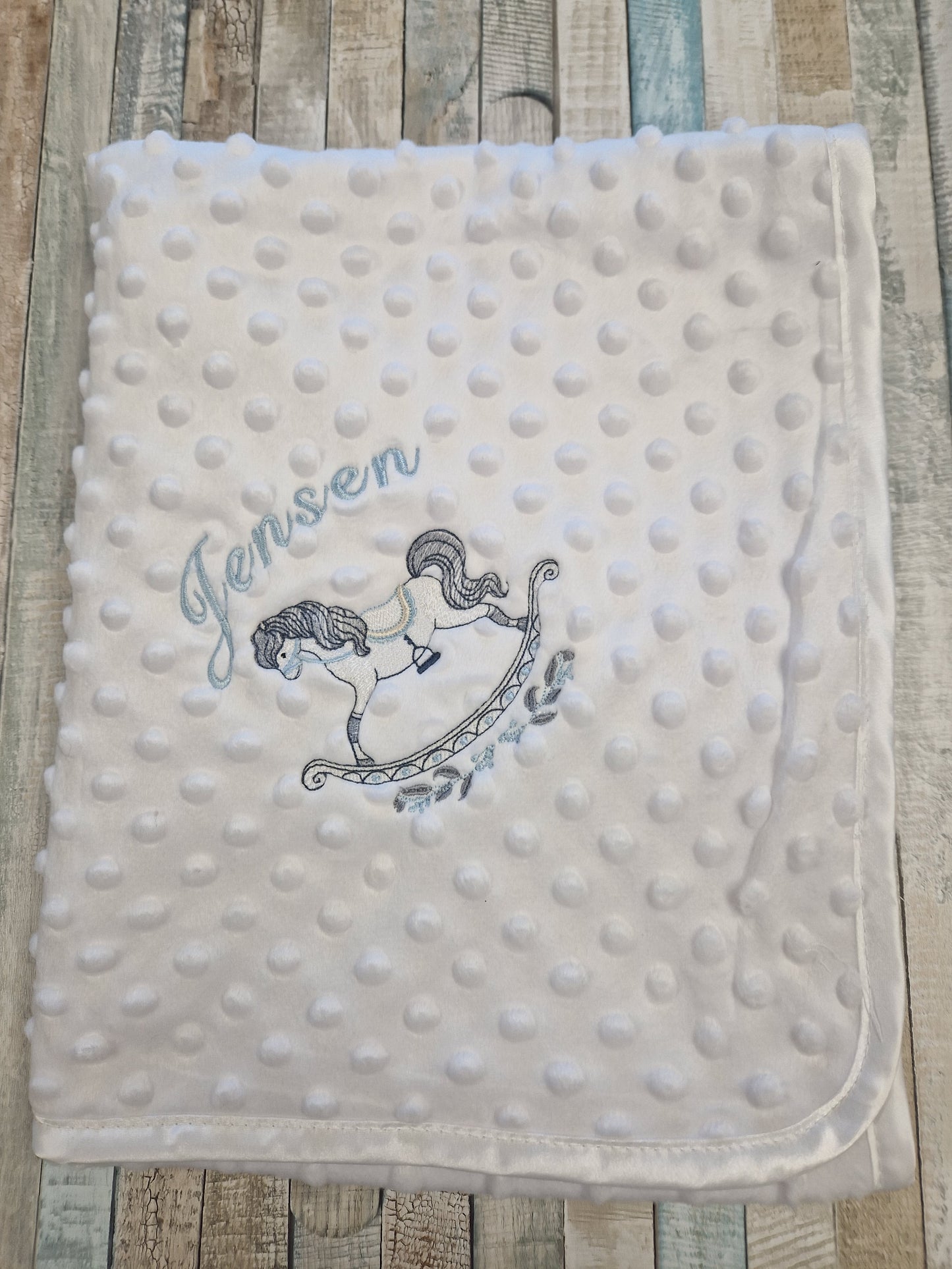 Personalised White Soft Dimple Wrap/Blanket With Blue Rocking Horse Design