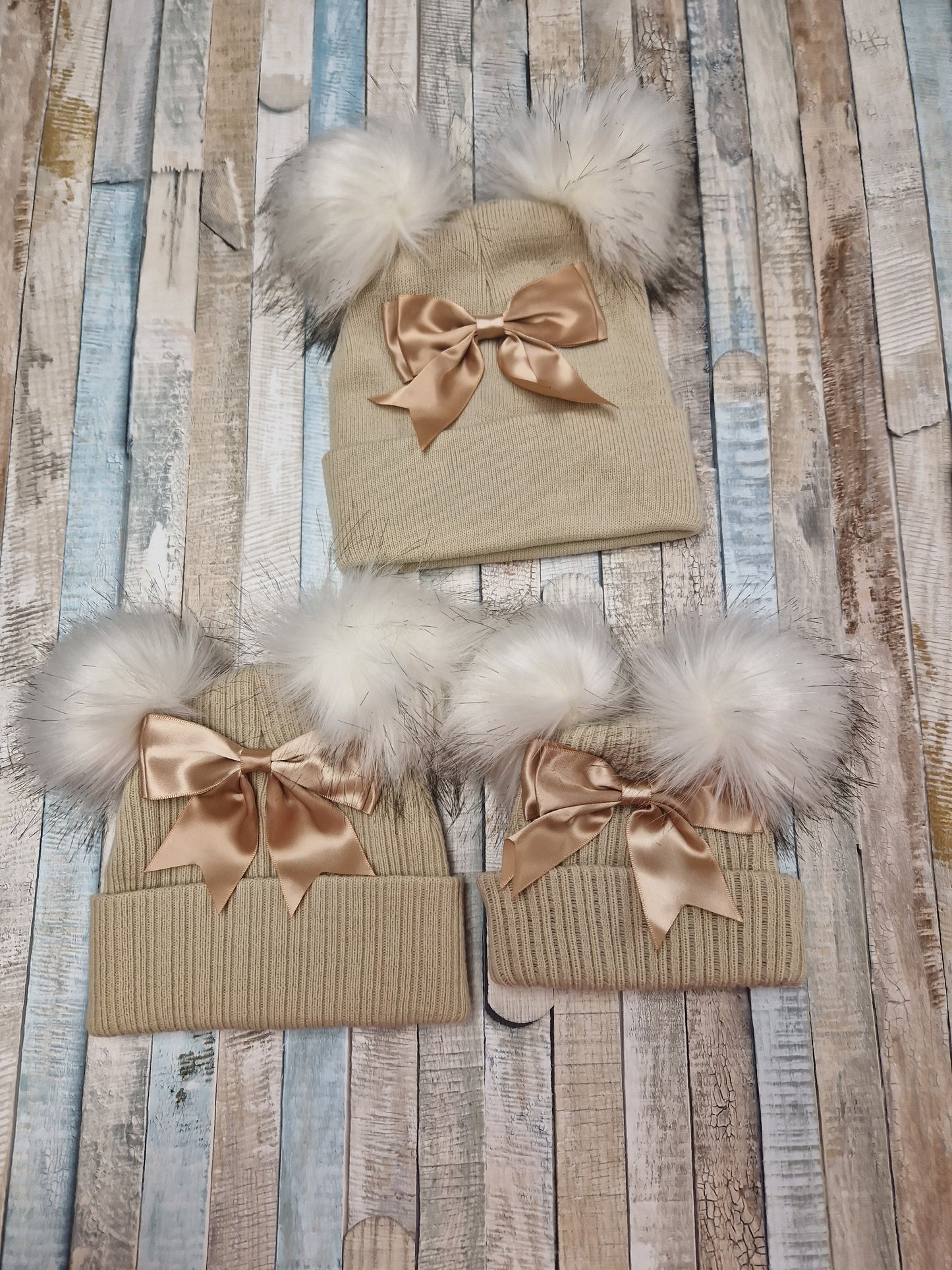 Baby Girls Beige And Gold Bow And Fluffy Double Pom Hat