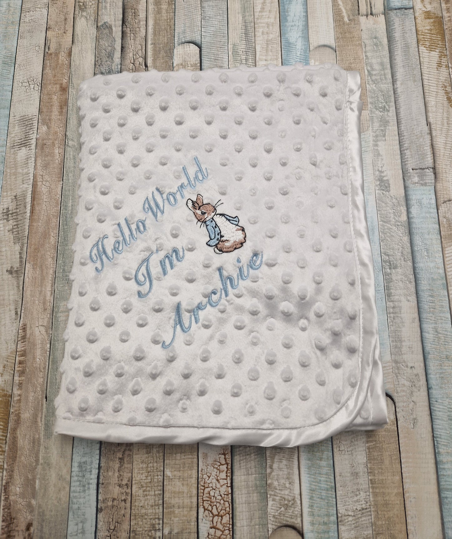 Personalised Hello World White Dimple Blanket/Wrap With Embroidered Blue Rabbit Design