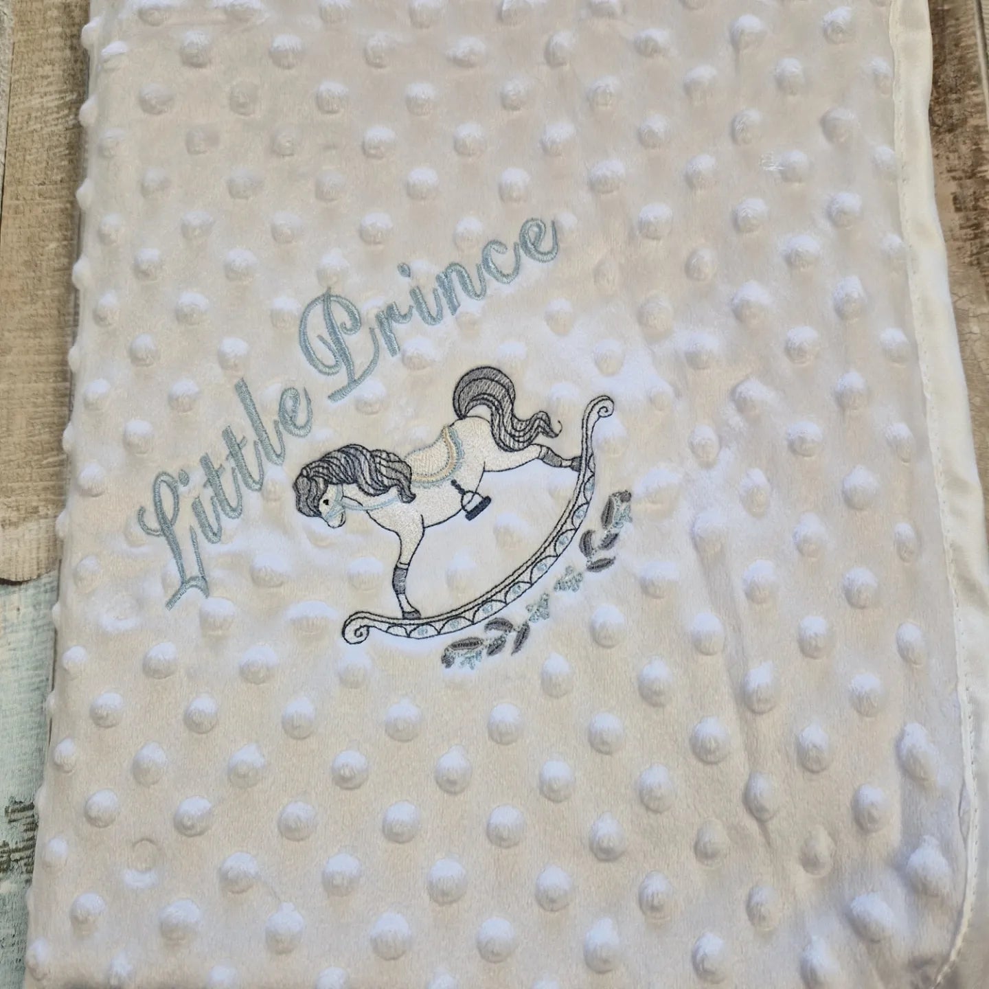 Personalised White Soft Dimple Wrap/Blanket With Blue Rocking Horse Design