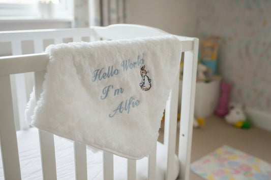Personalised Hello World White Soft Rose Blanket/Wrap With Embroidered Blue Rabbit Design