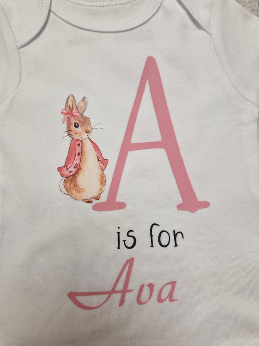 Personalised White Babygro With Printed Pink Rabbit Initial And Name