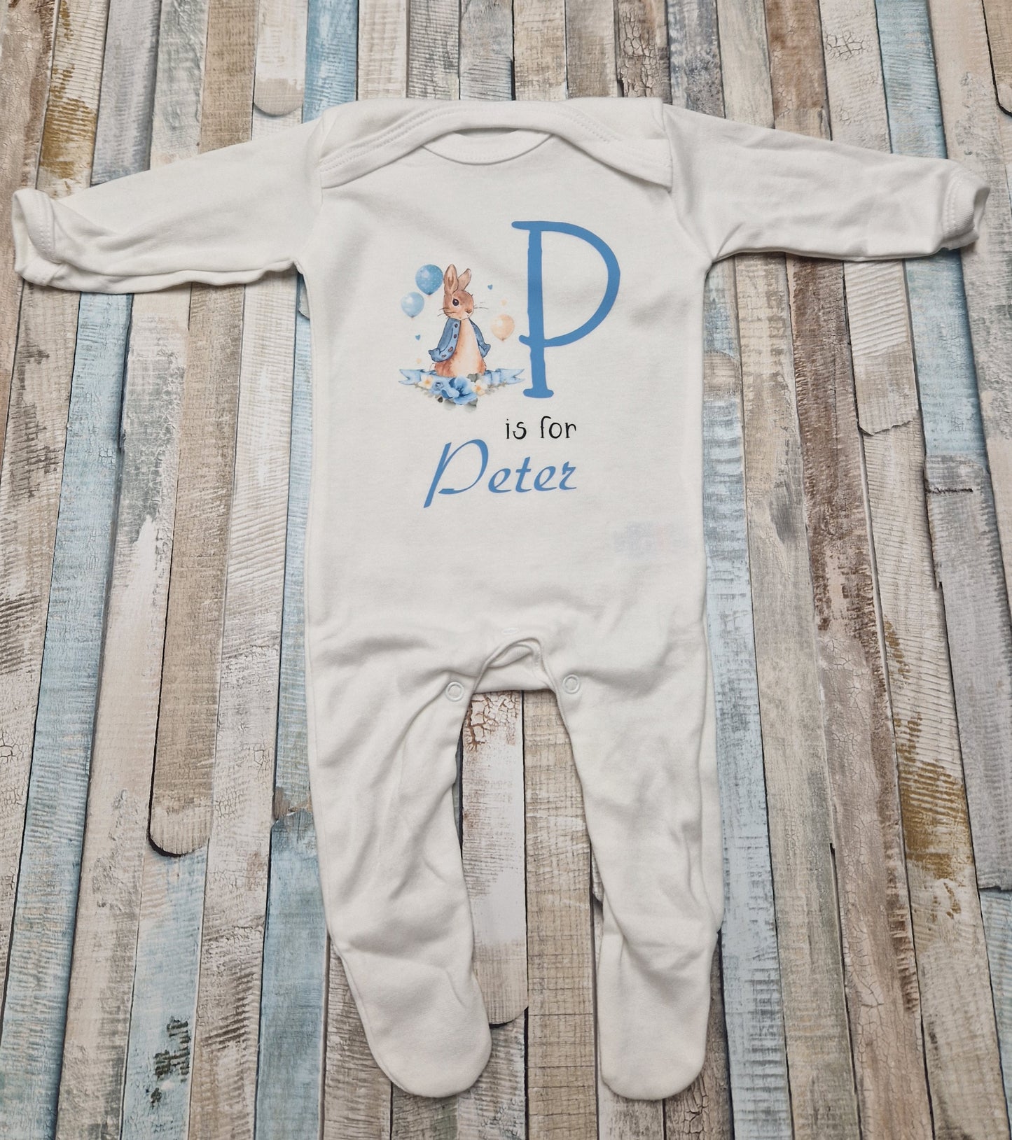 Personalised White Babygro With Printed Blue Rabbit Initial And Name