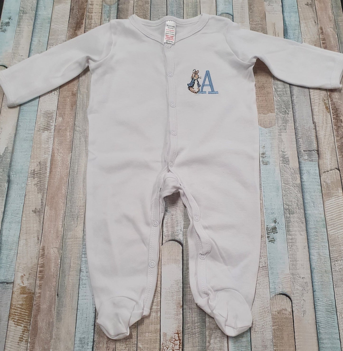 Personalised Baby Boys White Babygro With Embroidered Blue Rabbit With Initial