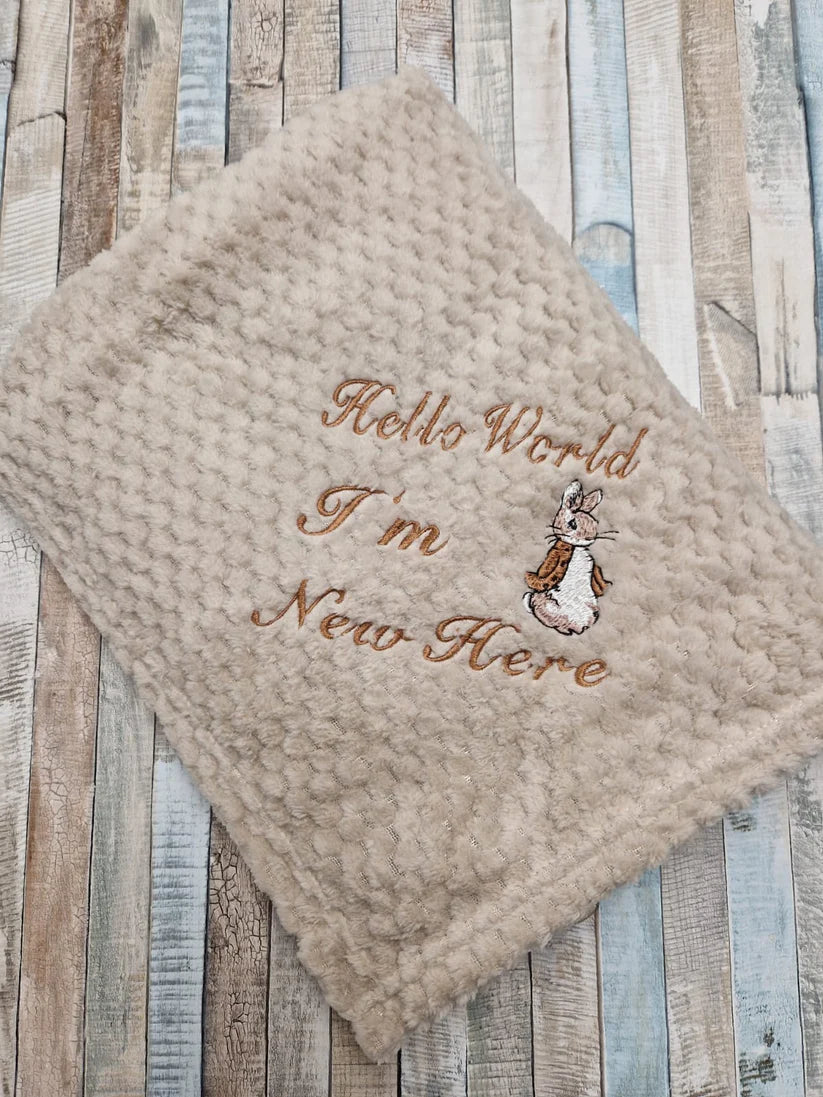 Unisex Baby Hello World I'm New Here Taupe Waffle Blanket/Wrap With Embroidered Gold Rabbit Design