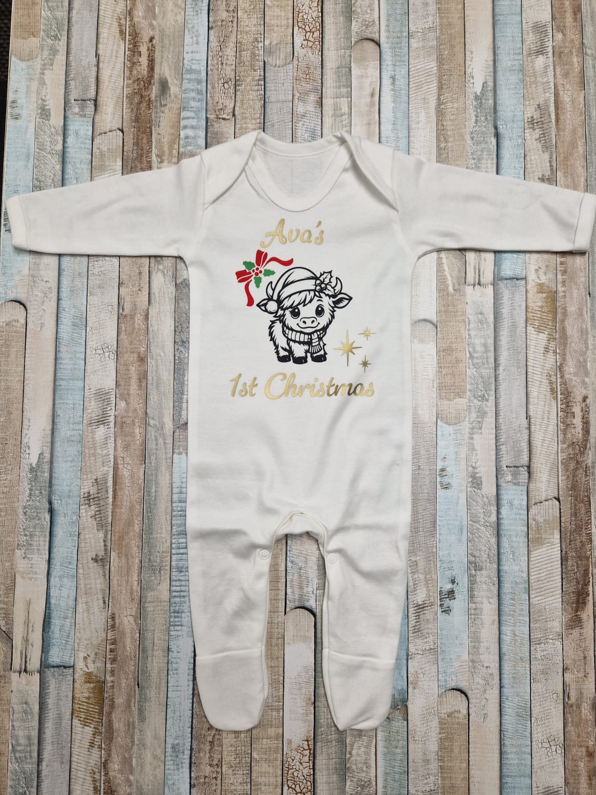 Baby Personalised 1st Christmas Babygro With Highland Cow Printed Design