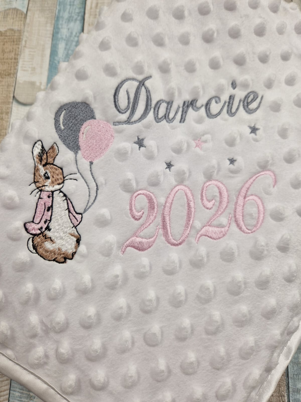 Personalised Baby Girls White Dimple Wrap With Pink Rabbit And Balloons And Year Of Birth