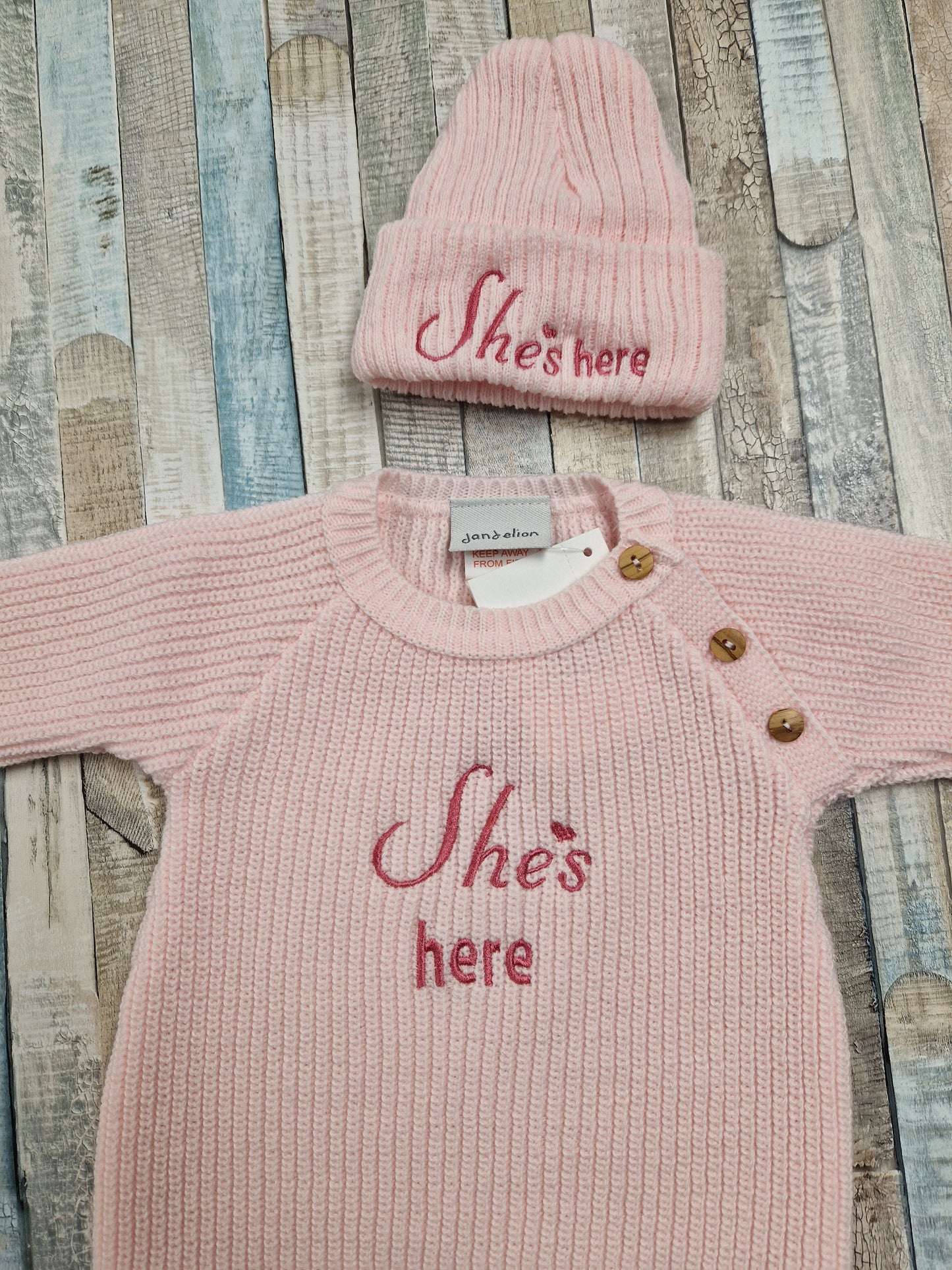 Baby Girls She's Here Long Sleeved Knitted Romper And Beanie