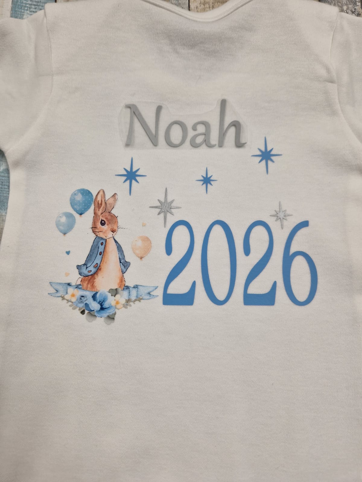 Personalised White Printed Babygro With Blue Rabbit Year Born