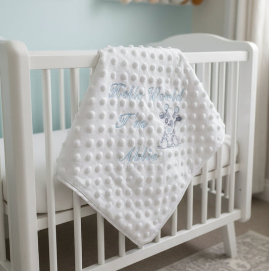 Personalised Hello World White Dimple Wrap With Blue Giraffe Embroidered Design