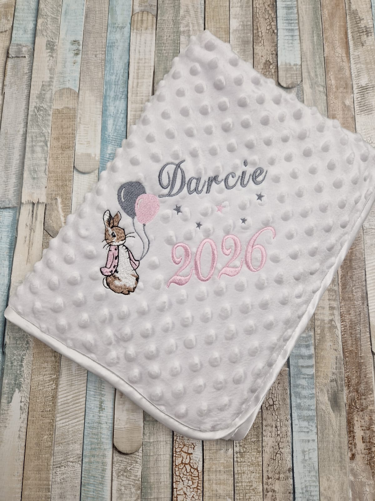 Personalised Baby Girls White Dimple Wrap With Pink Rabbit And Balloons And Year Of Birth