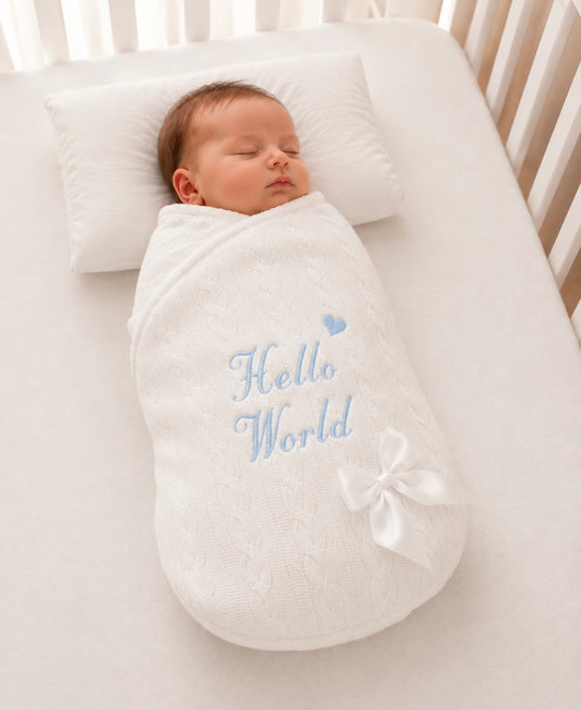 White Cable Design Swaddle With Hello World In Blue Embroidery