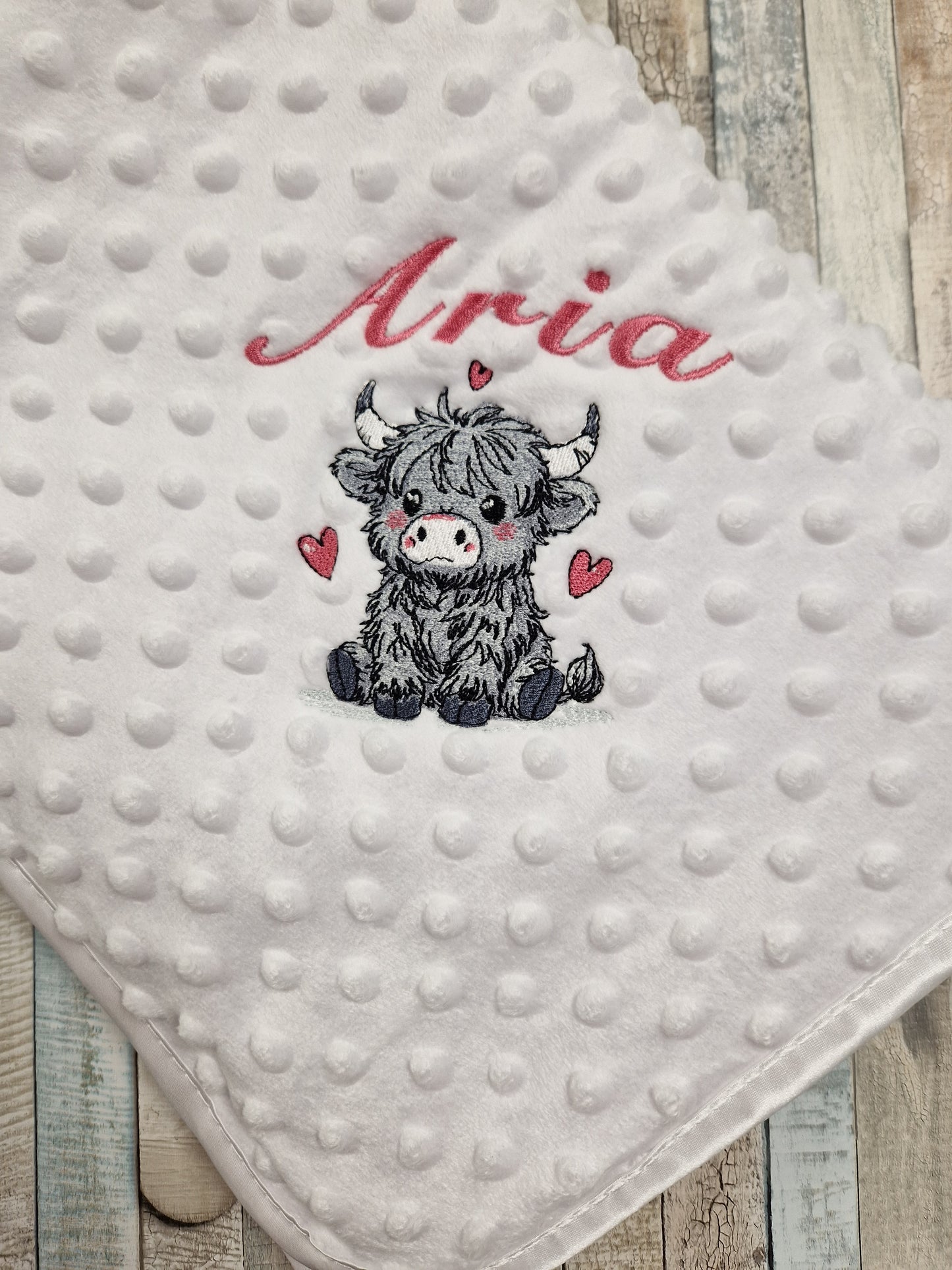Baby Girls Personalised White Dimple Wrap With Grey Highland Cow