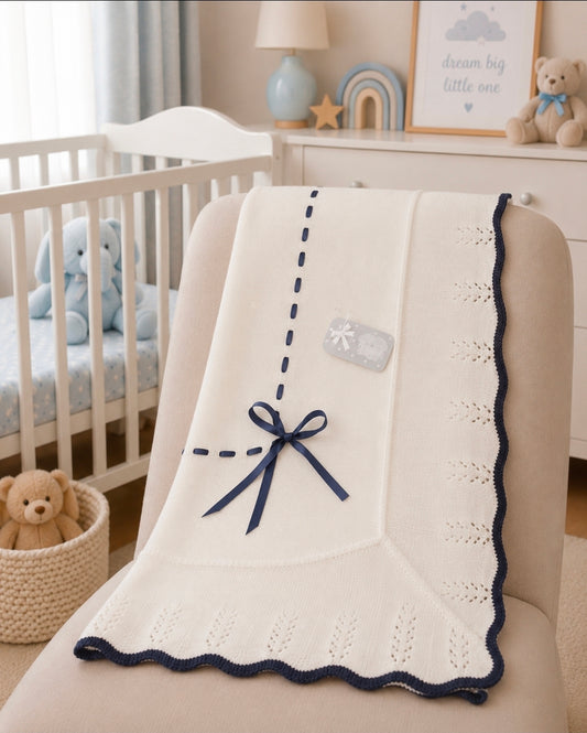 Unisex Baby White And Navy Knitted Shawl With Navy Satin Ribbon
