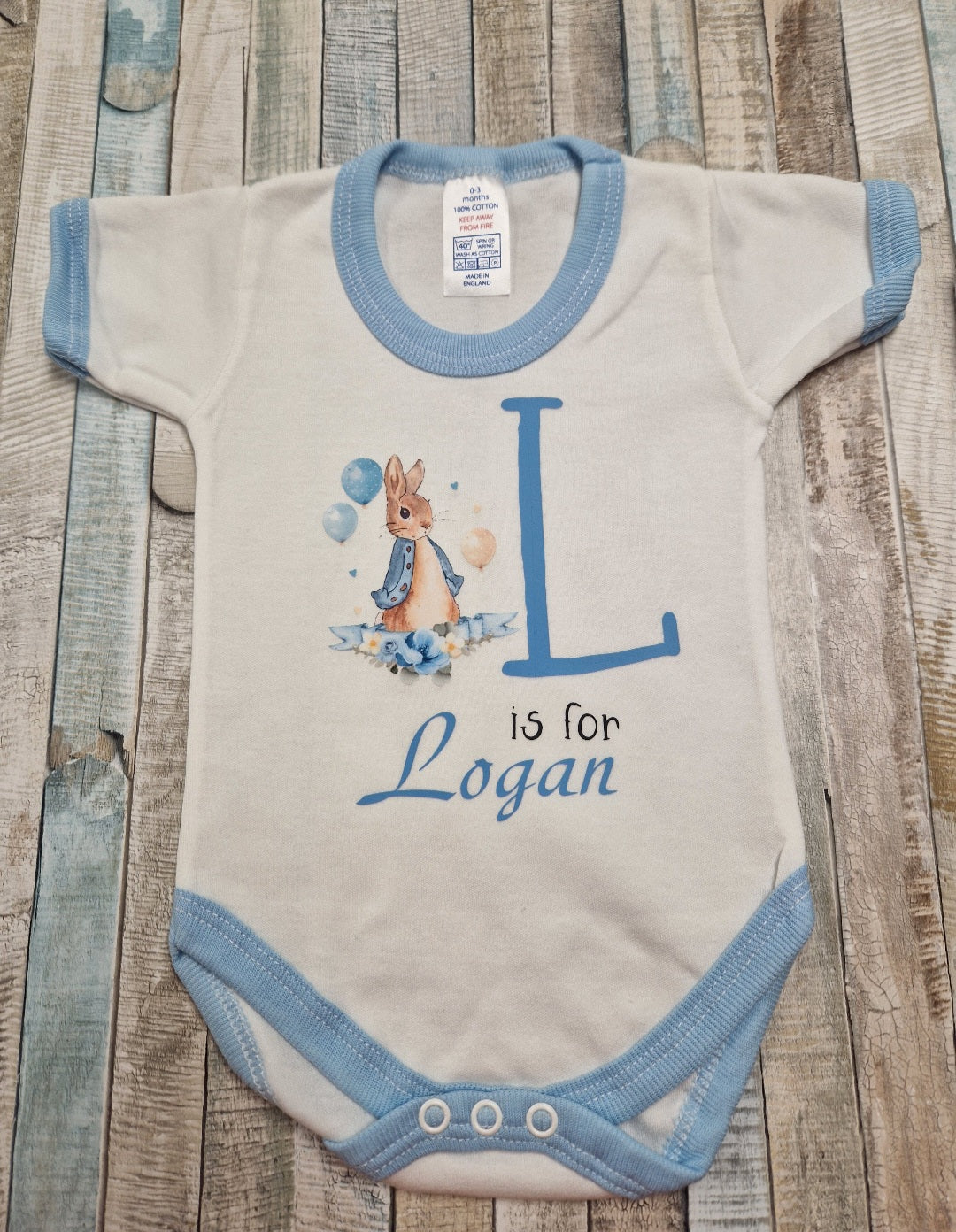 Baby Boys Personalised White And Blue Vest With Initial and Printed Rabbit