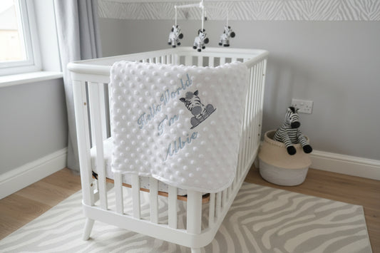 Personalised Hello World White Dimple Wrap With Blue Zebra Embroidered Design