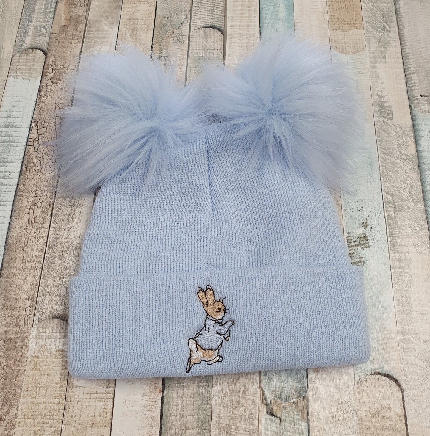 Baby Boys Blue Knitted Rabbit Double Blue Fluffy Pom Hat - Nana B Baby & Childrenswear Boutique